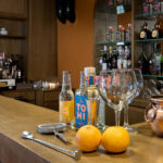 TOHI Cloudberry Mist Noridc Dry Gin on a distillery bar counter
