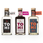 3 Tohi Gin bottles. London Dry Gin, Aronia GIn and the Cloudberry Gin